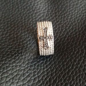 Men's ring with black cross
